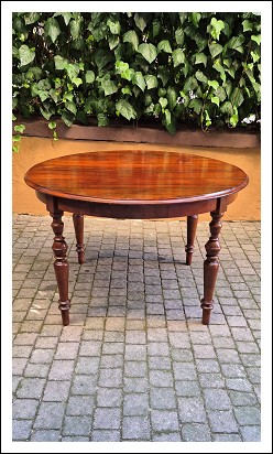 Tavolo tondo antico allungabile dell’800 in noce